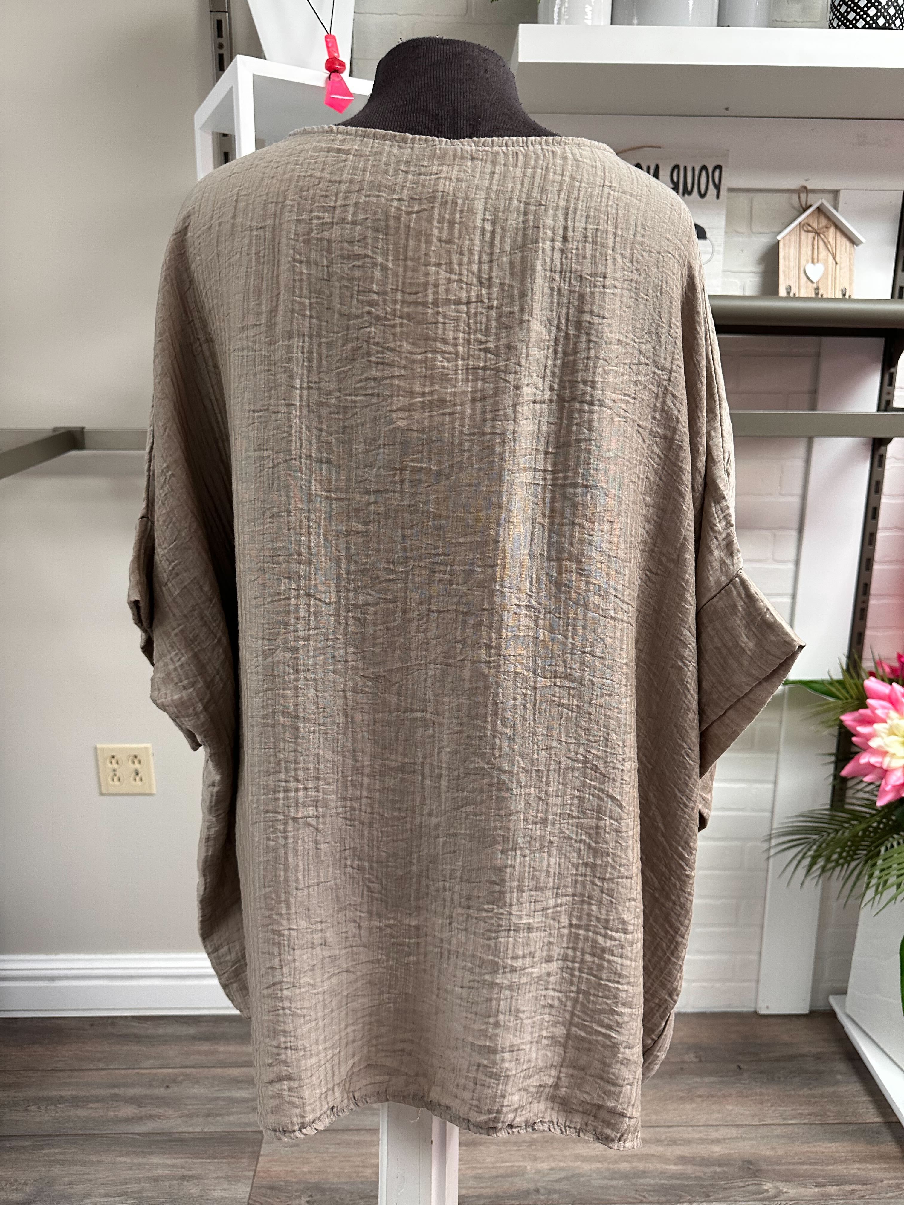 Blouse avec boutons brillants