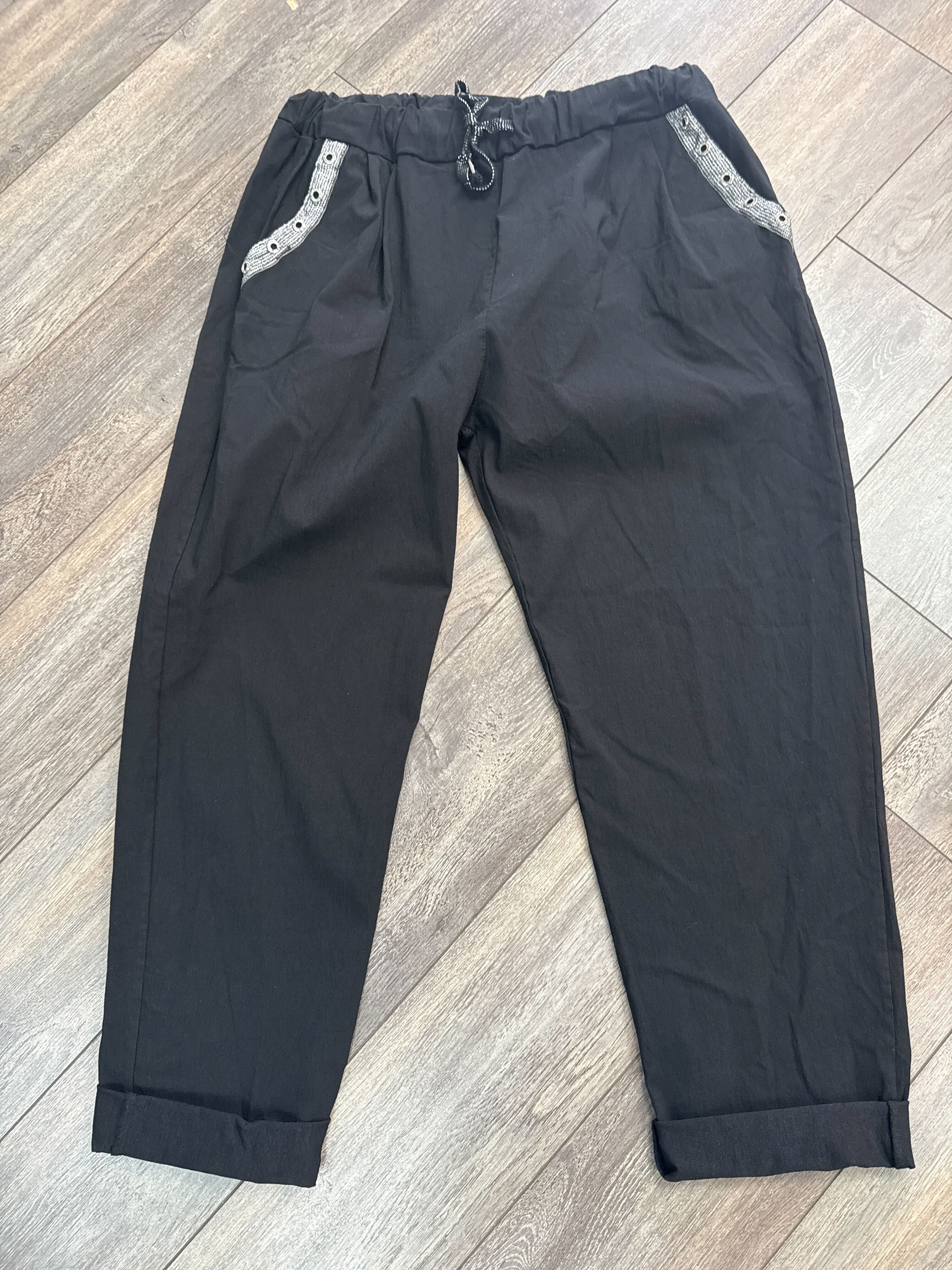 Pantalon magique avec boutons brillants