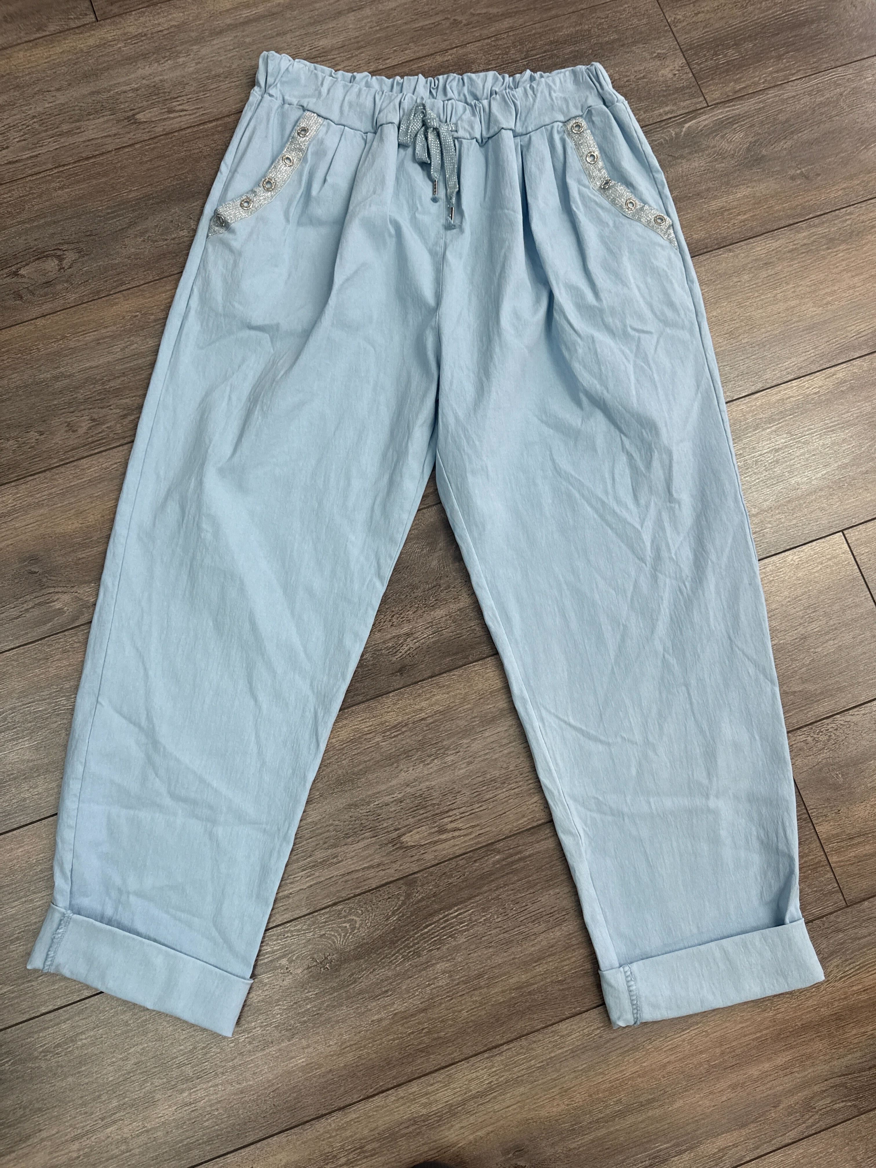 Pantalon magique avec boutons brillants