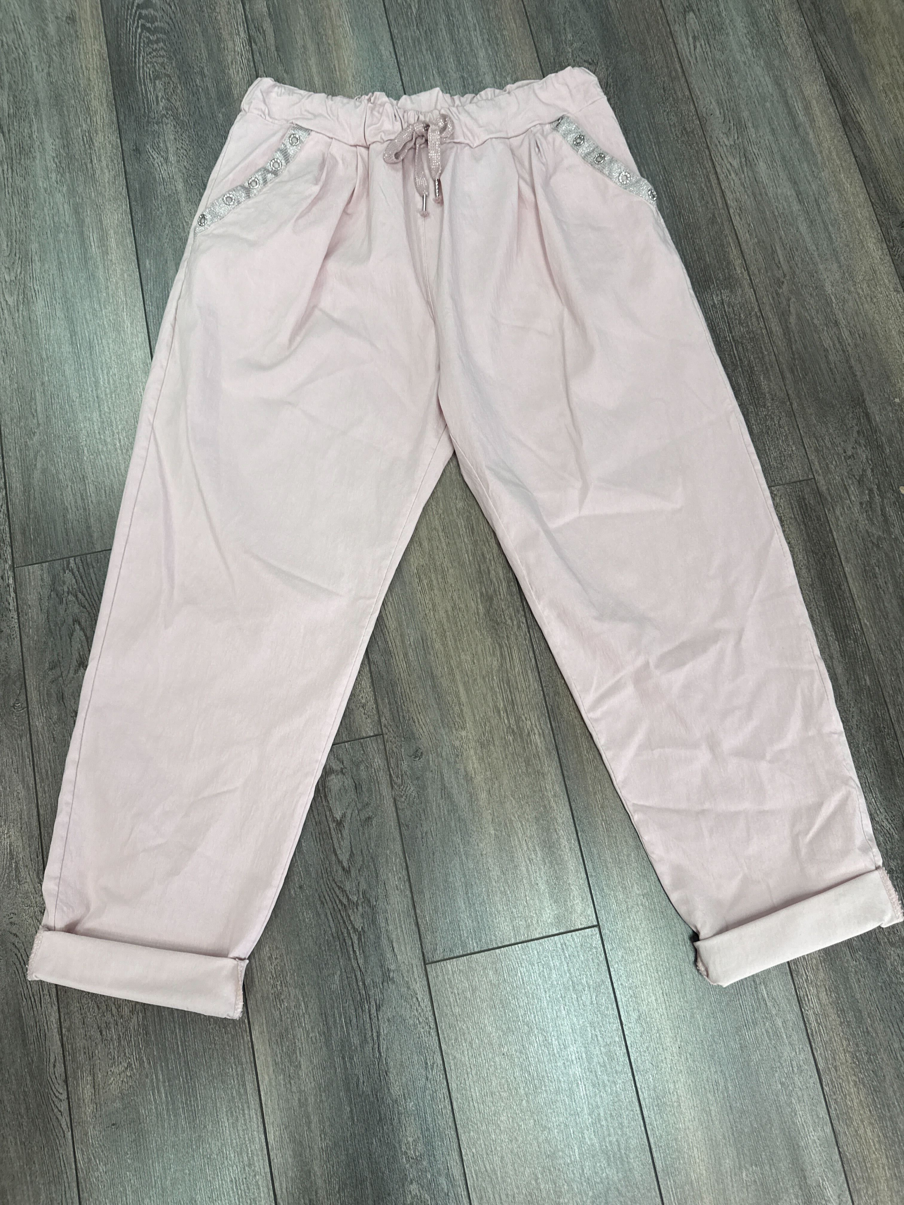 Pantalon magique avec boutons brillants