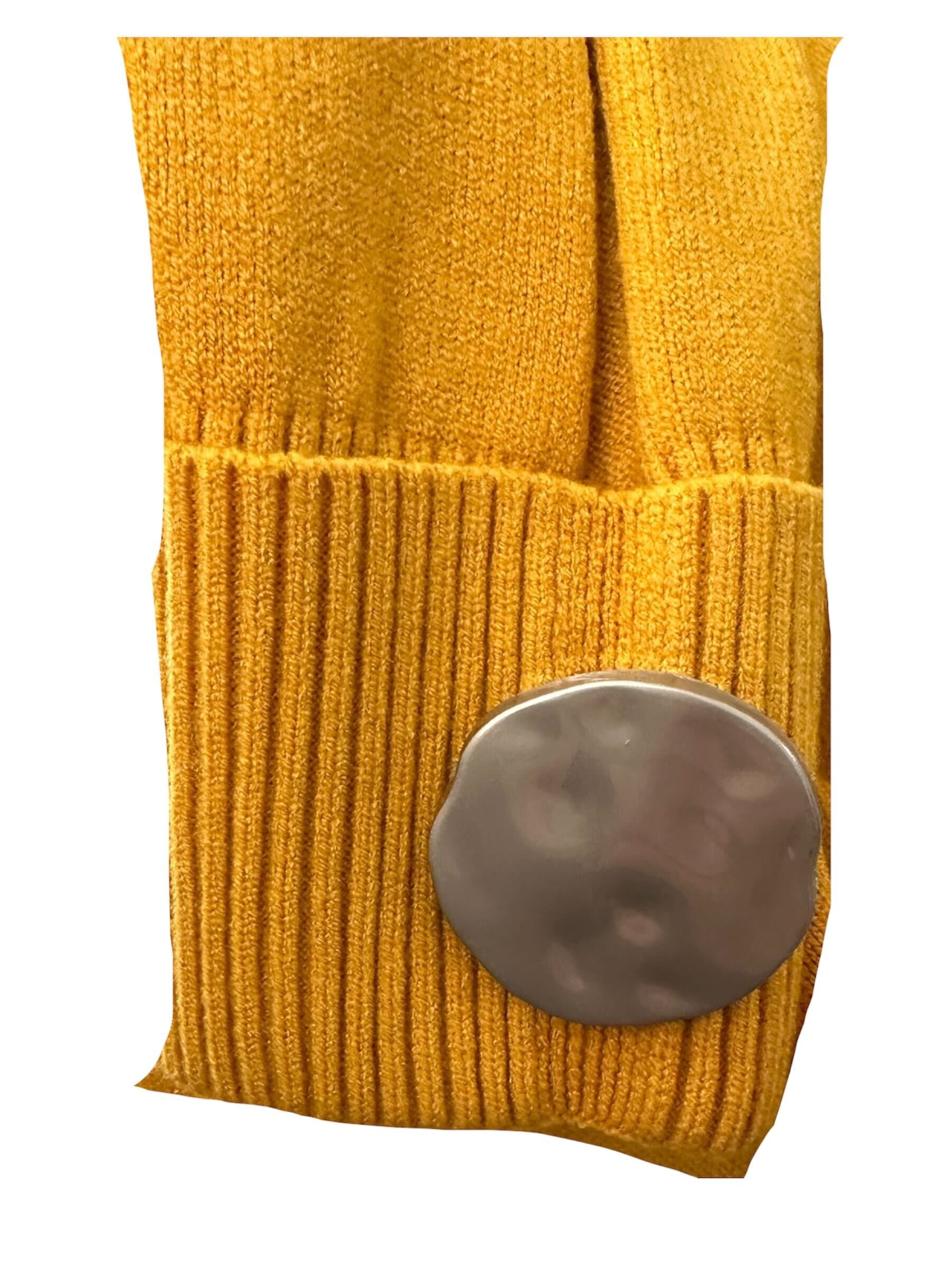 Chandail avec boutons sur les poignets