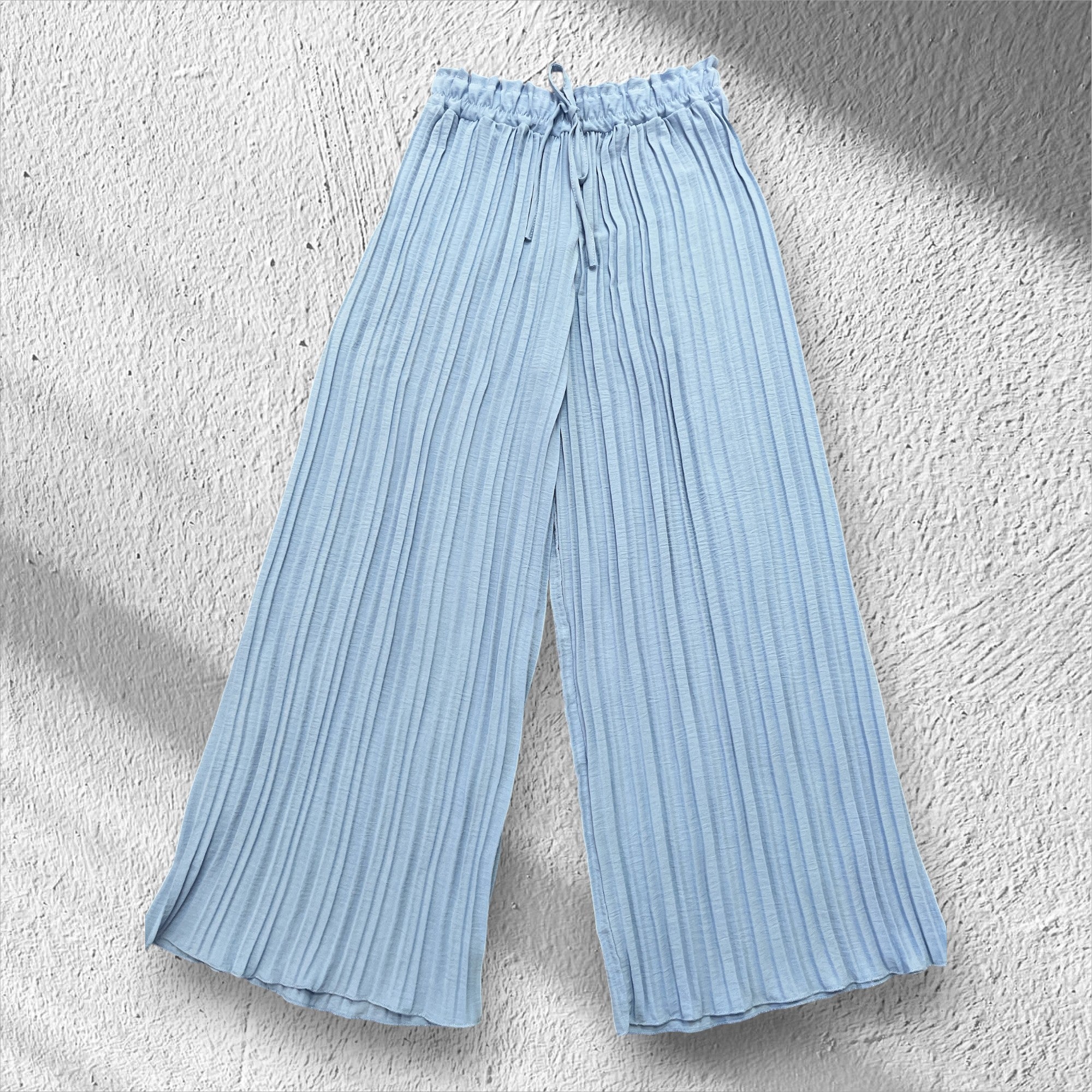 Pantalons à plis