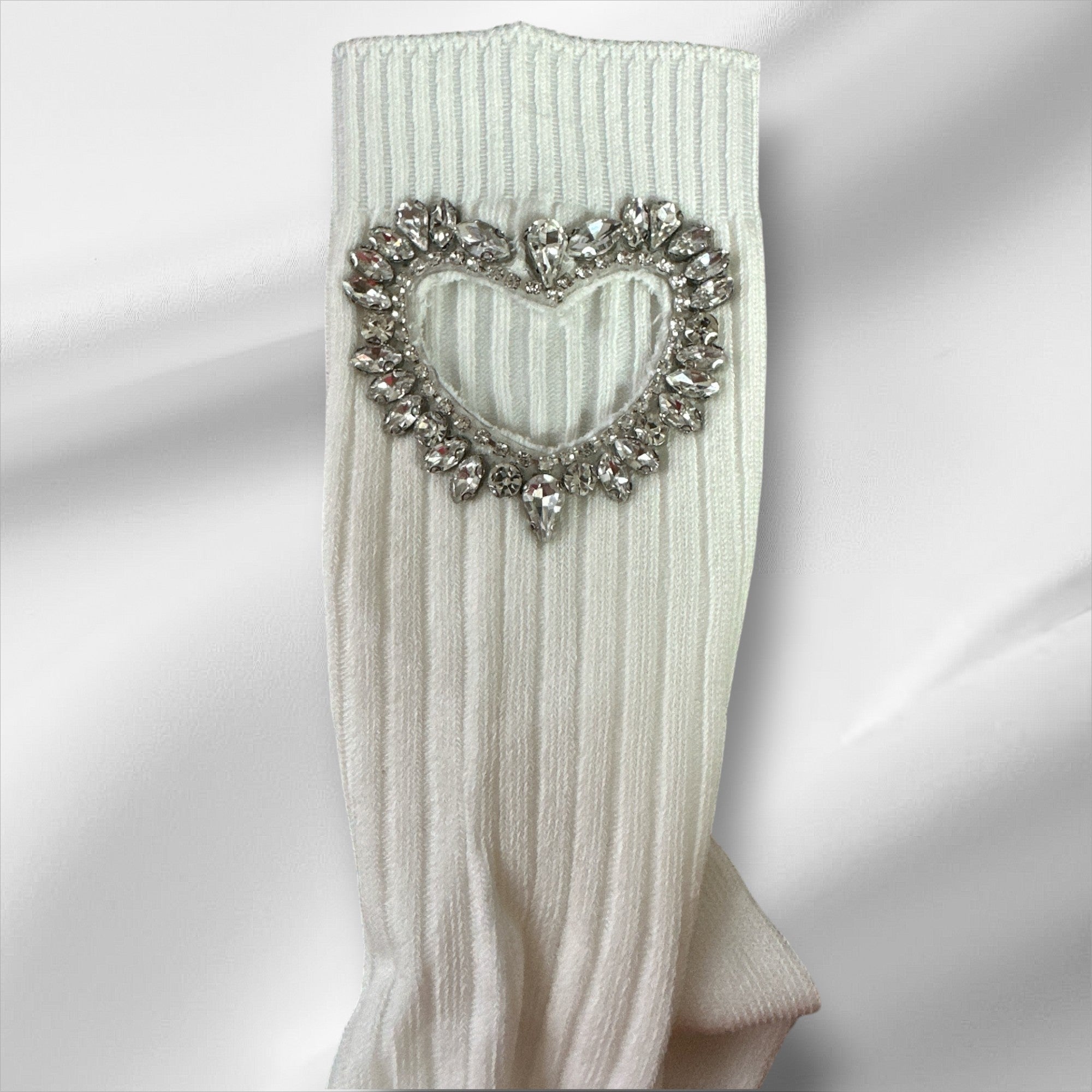 Bas avec ouverture en coeur diamants