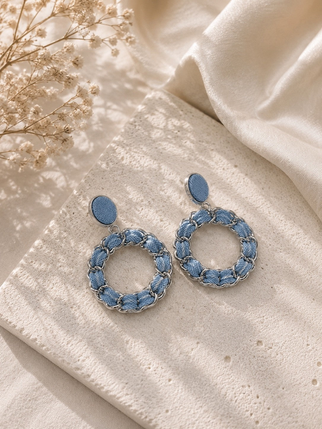 Boucle d'oreille (jeans)