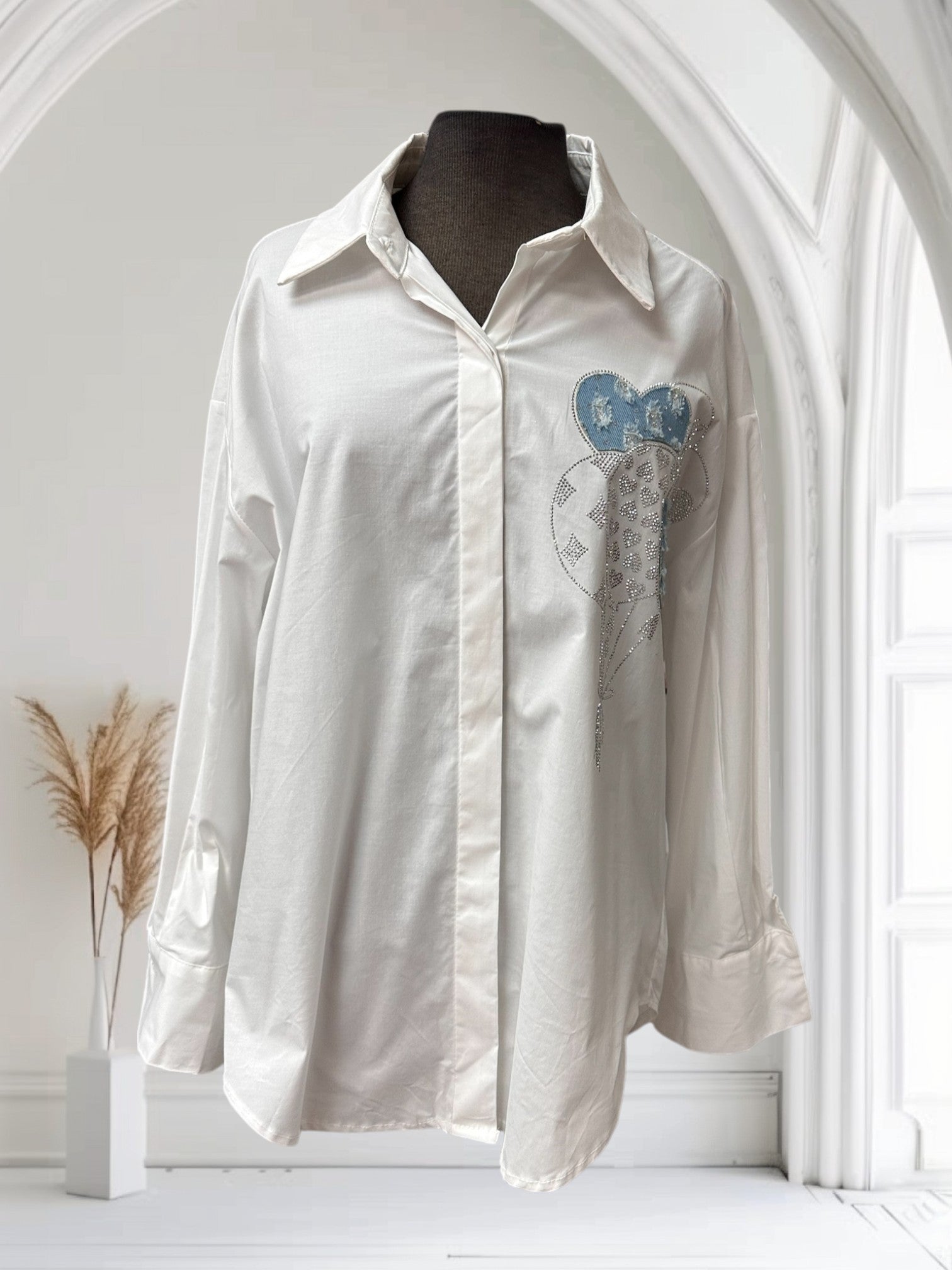 Blouse blanche avec motif brillant