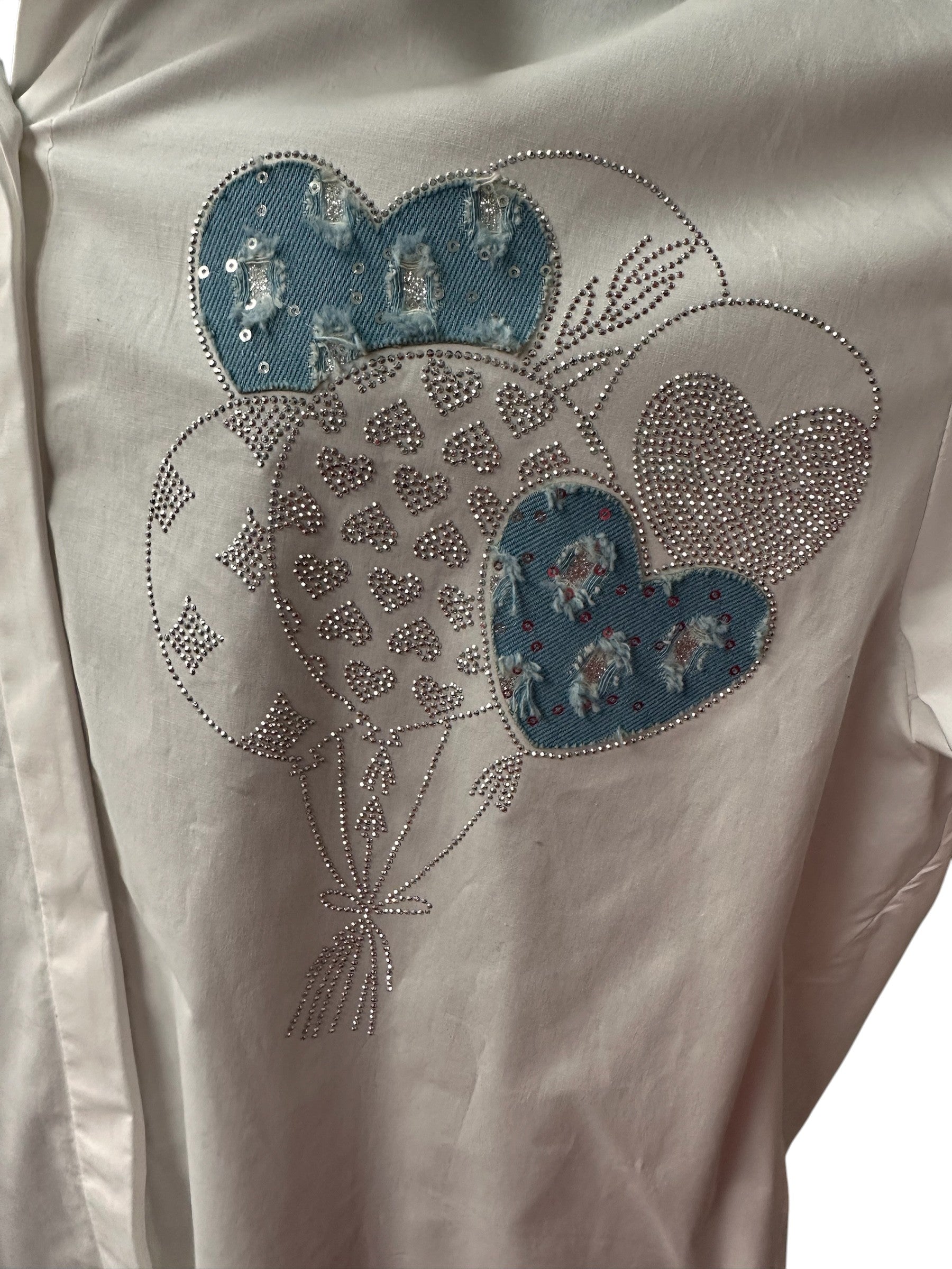 Blouse blanche avec motif brillant