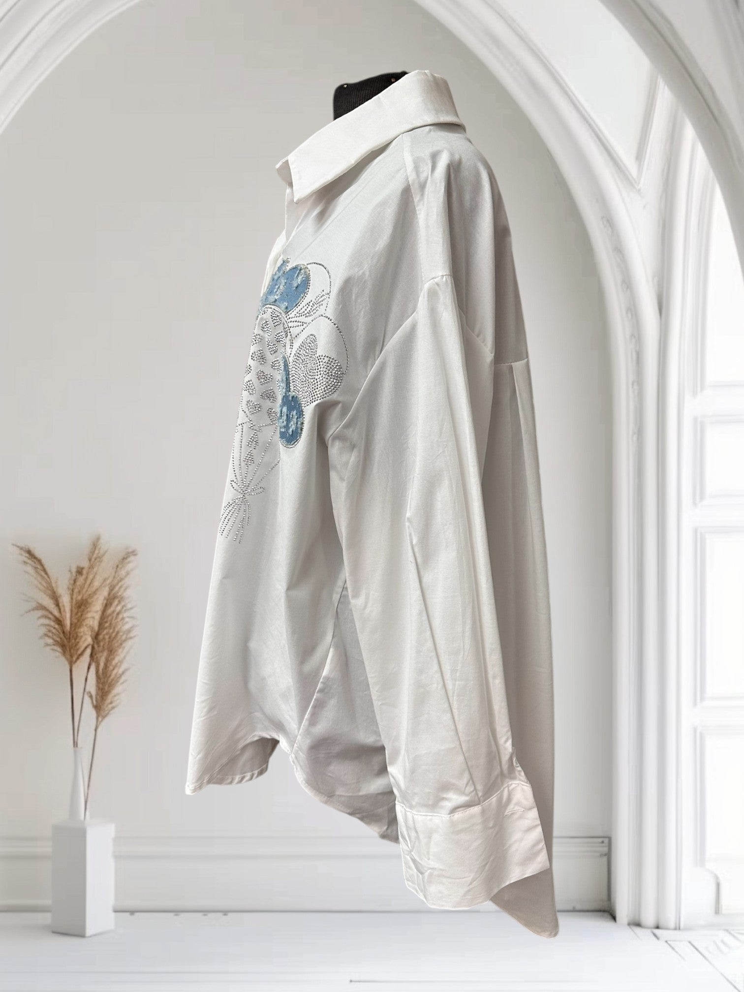 Blouse blanche avec motif brillant