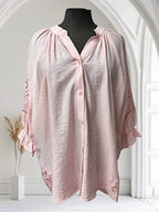 Blouse avec broderie sur la manche