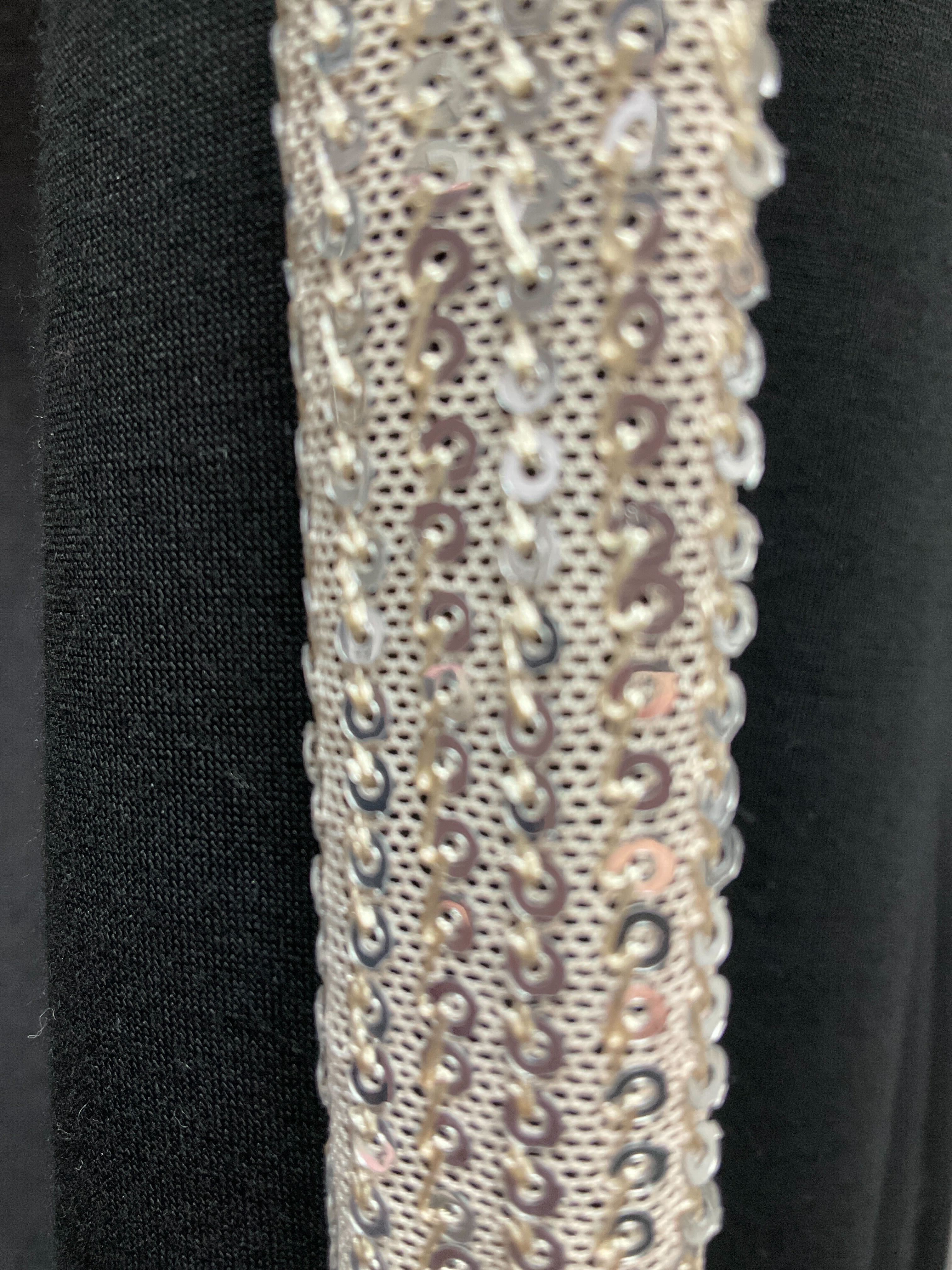 Pantalon avec bande brillante sur le côté