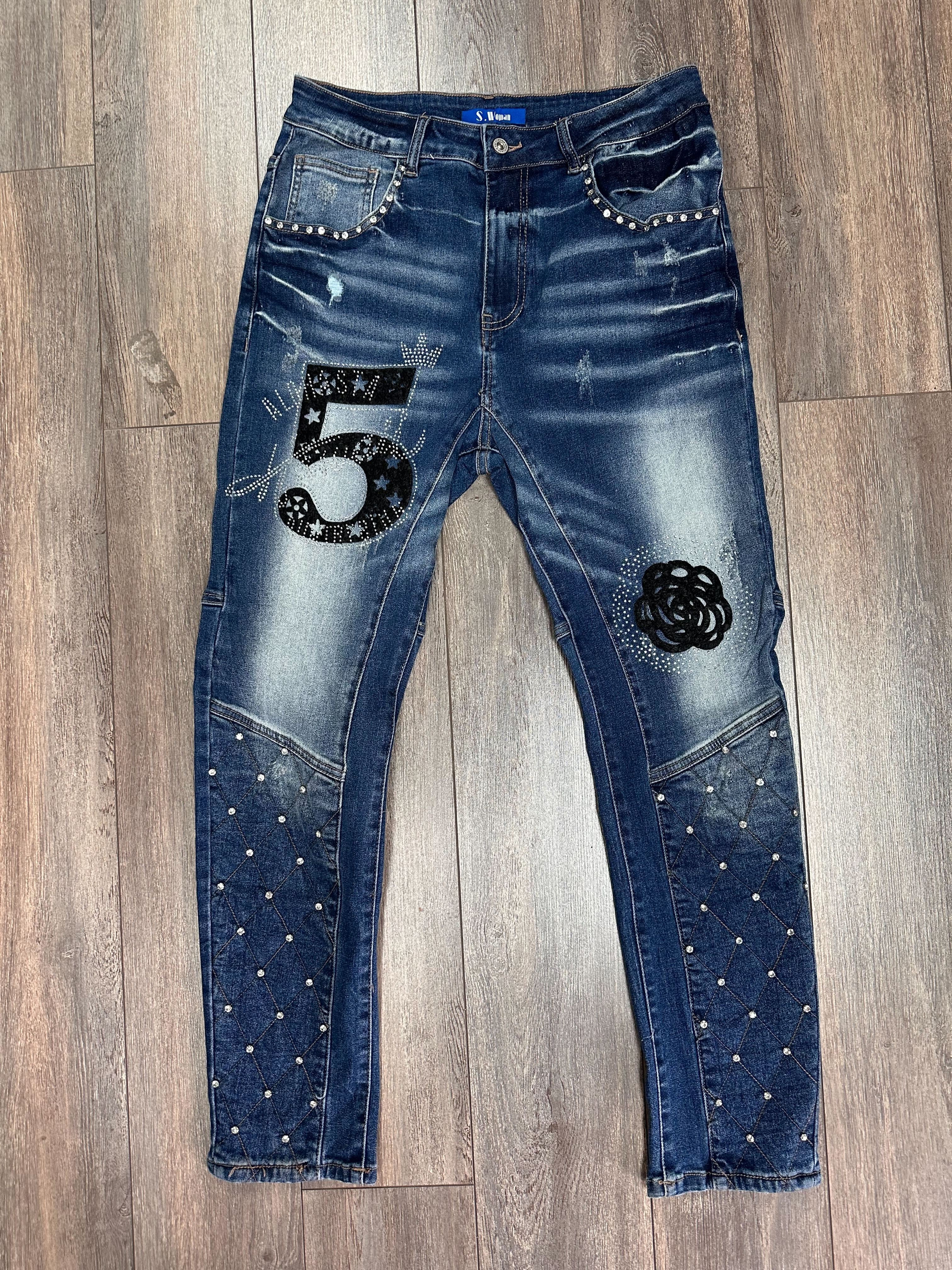 Nouveauté jeans avec fleurs noires