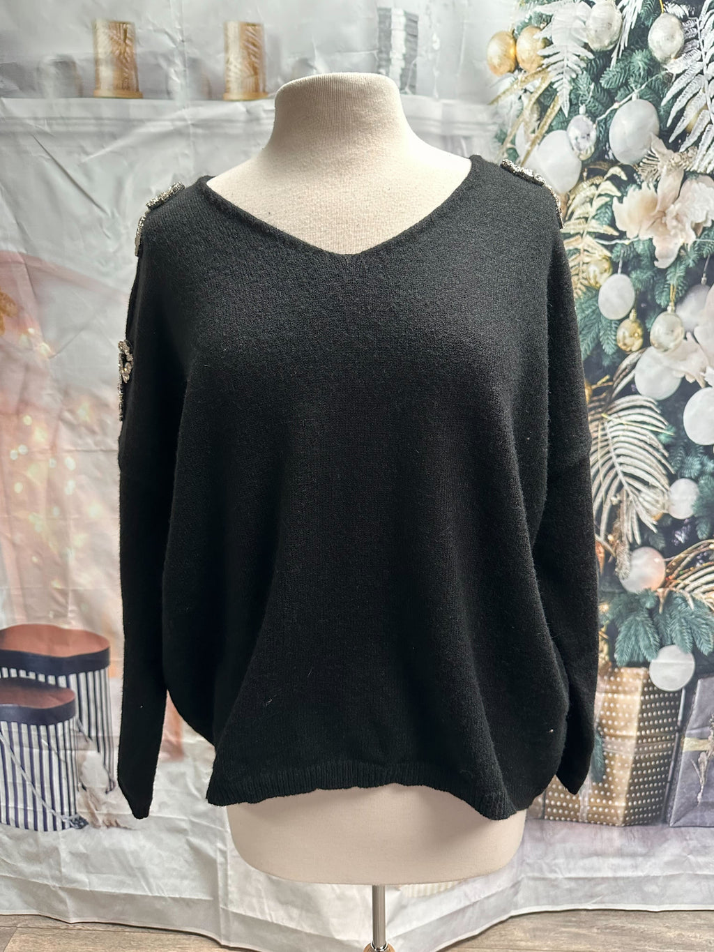 Chandail avec boucles en diamants