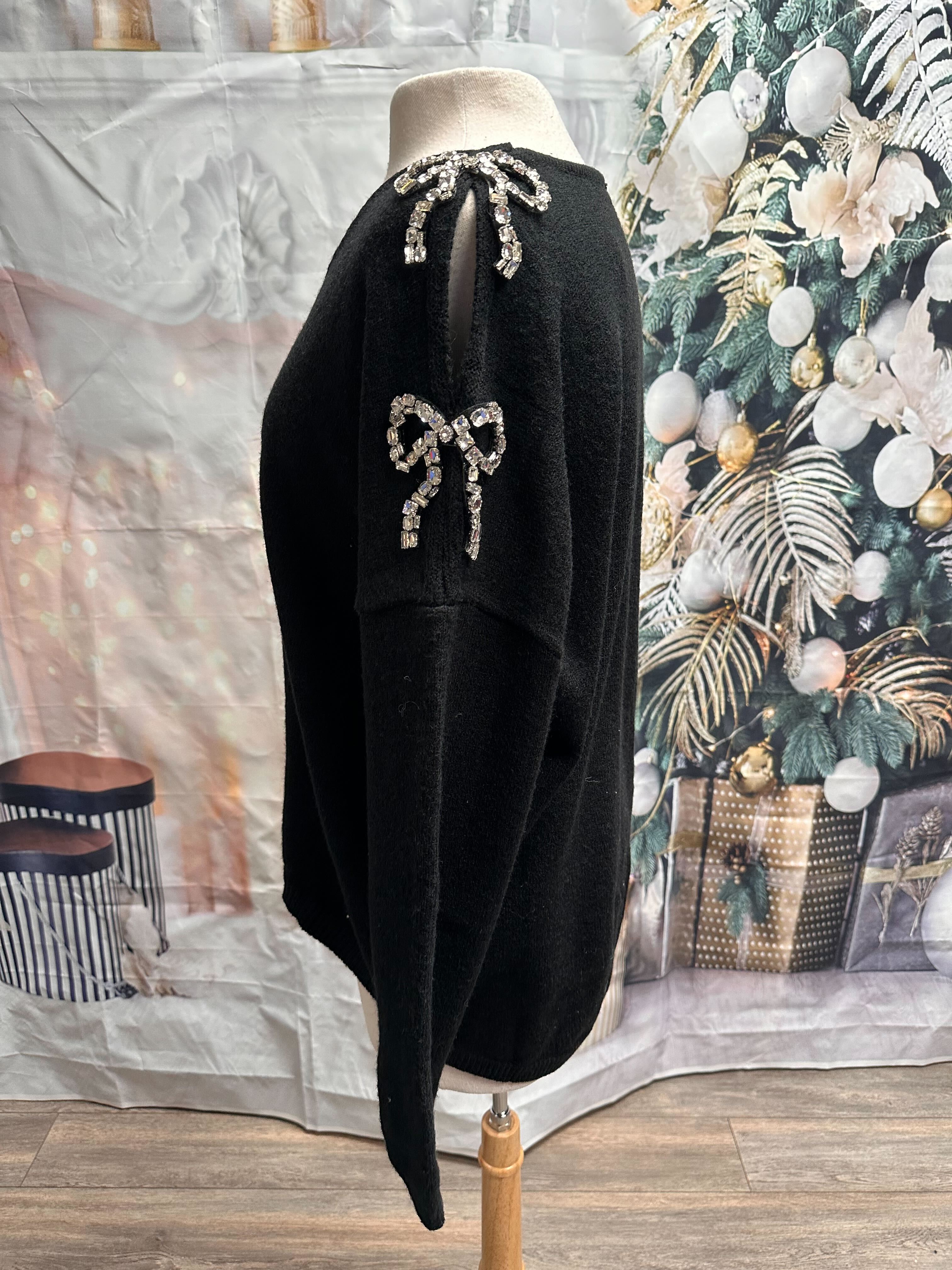 Chandail avec boucles en diamants