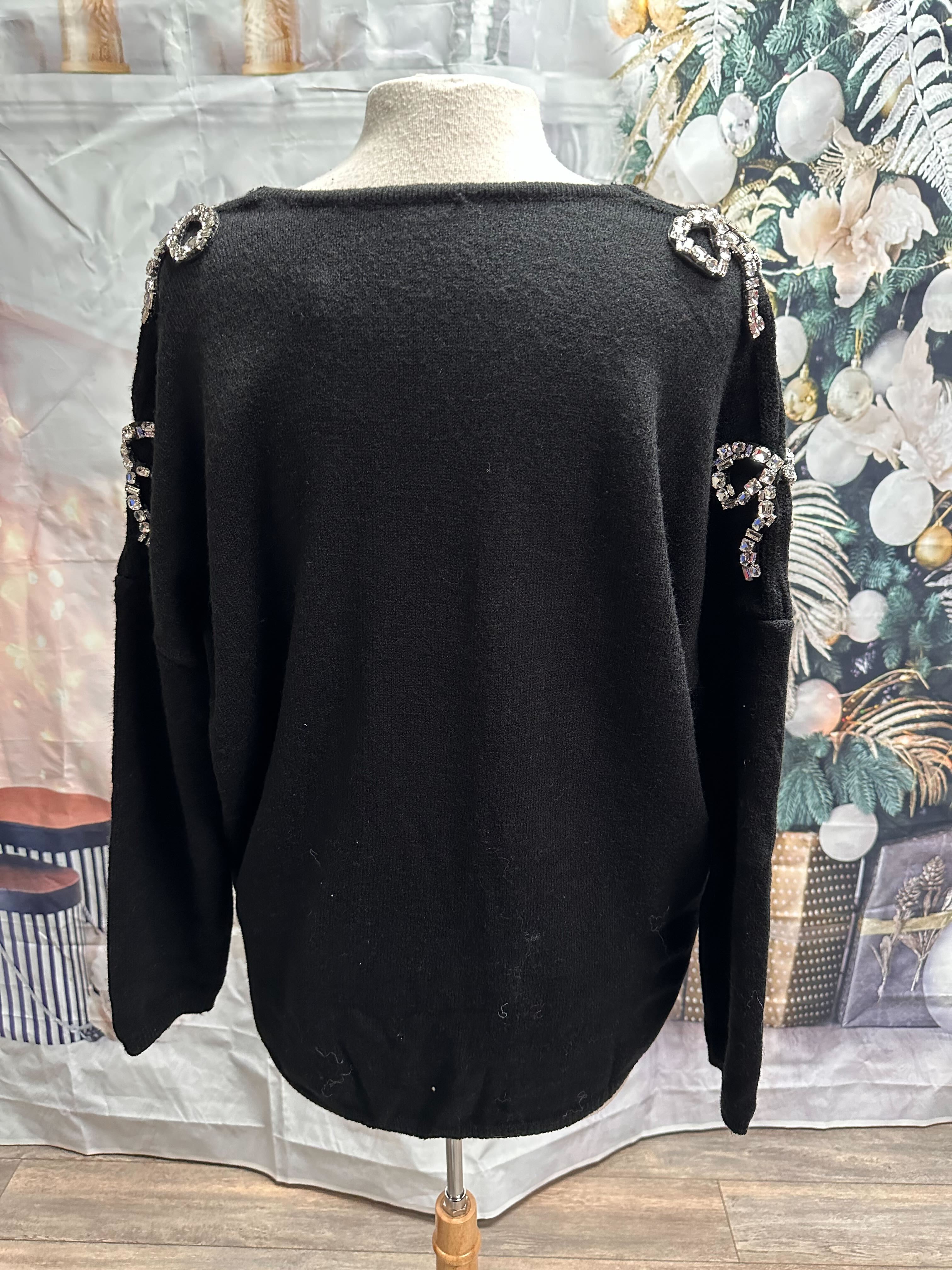 Chandail avec boucles en diamants