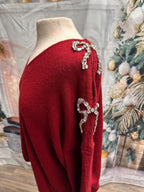 Chandail avec boucles en diamants