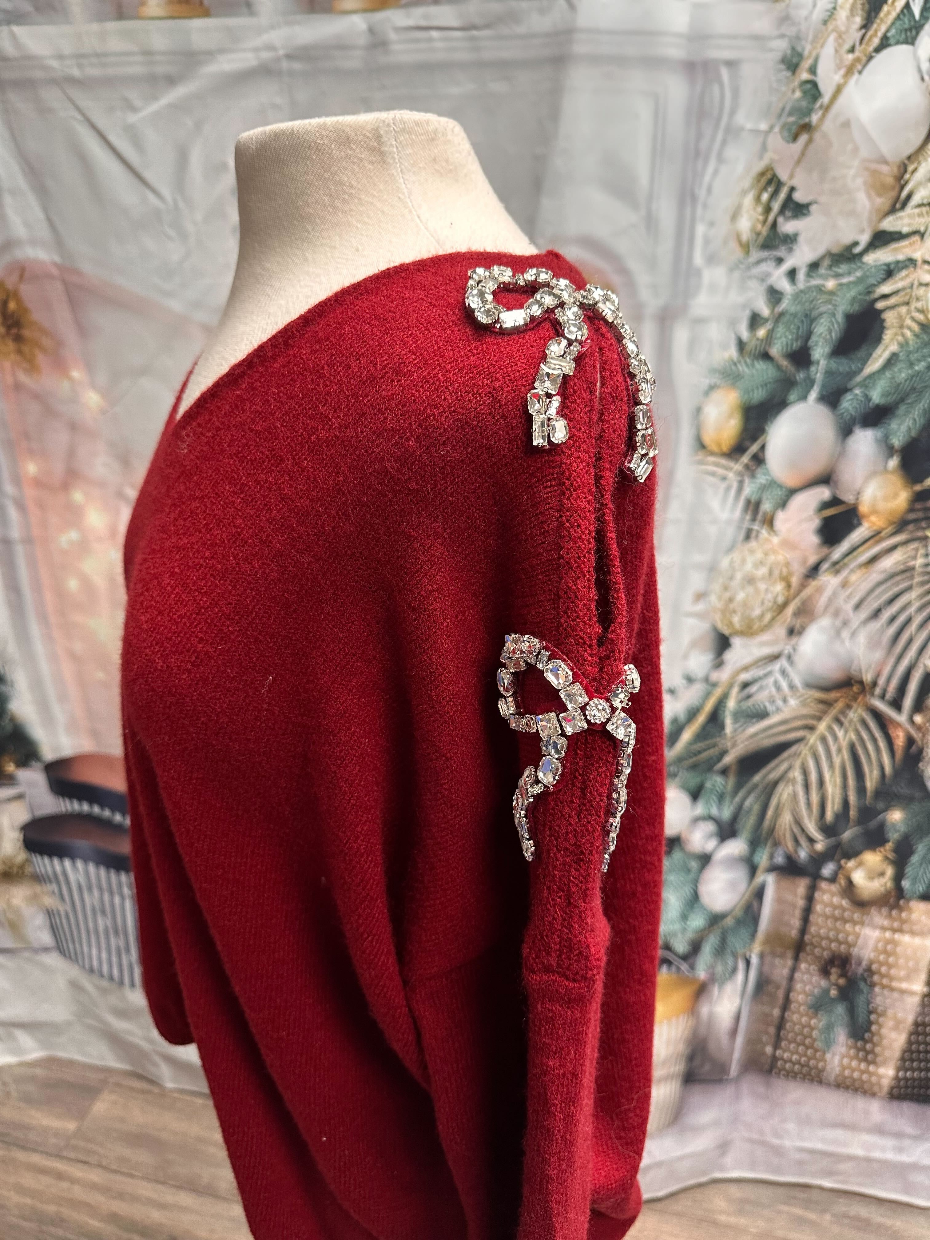 Chandail avec boucles en diamants