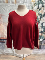 Chandail avec boucles en diamants