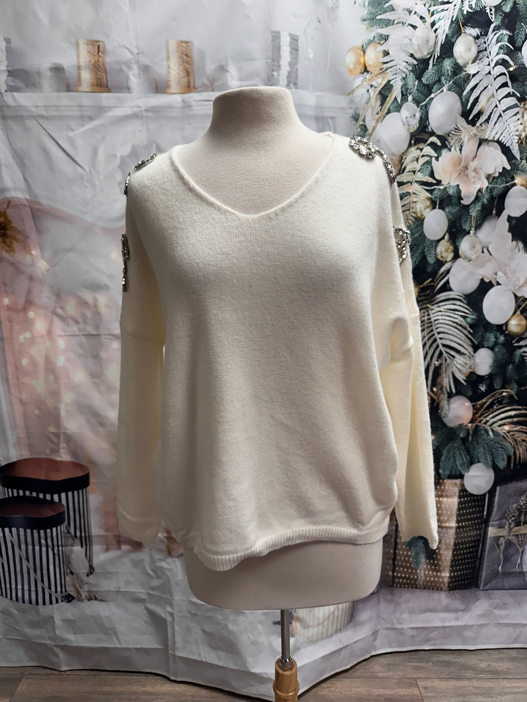 Chandail avec boucles en diamants