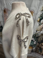 Chandail avec boucles en diamants