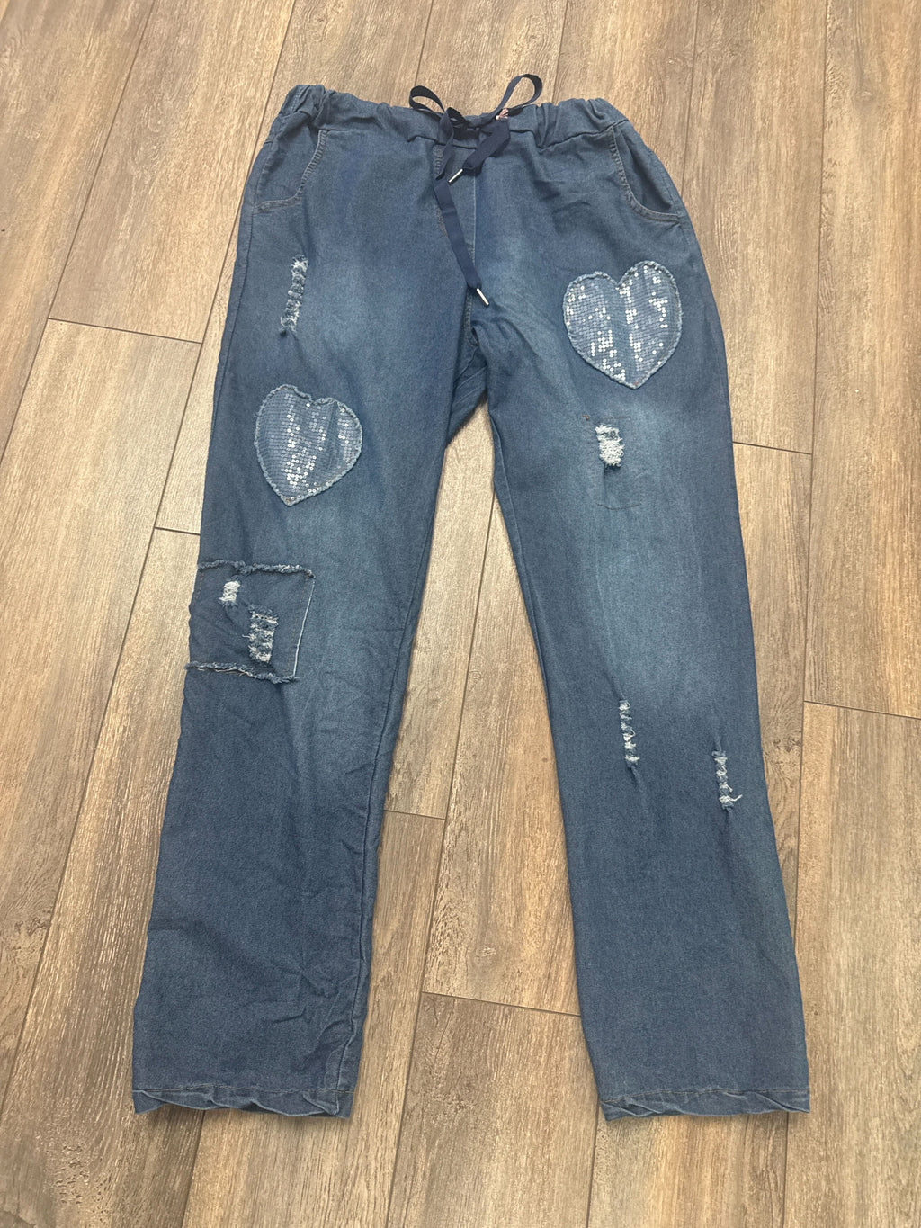 Jeans avec cœurs en paillettes