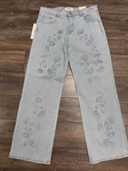 Jeans avec fleurs en brillants