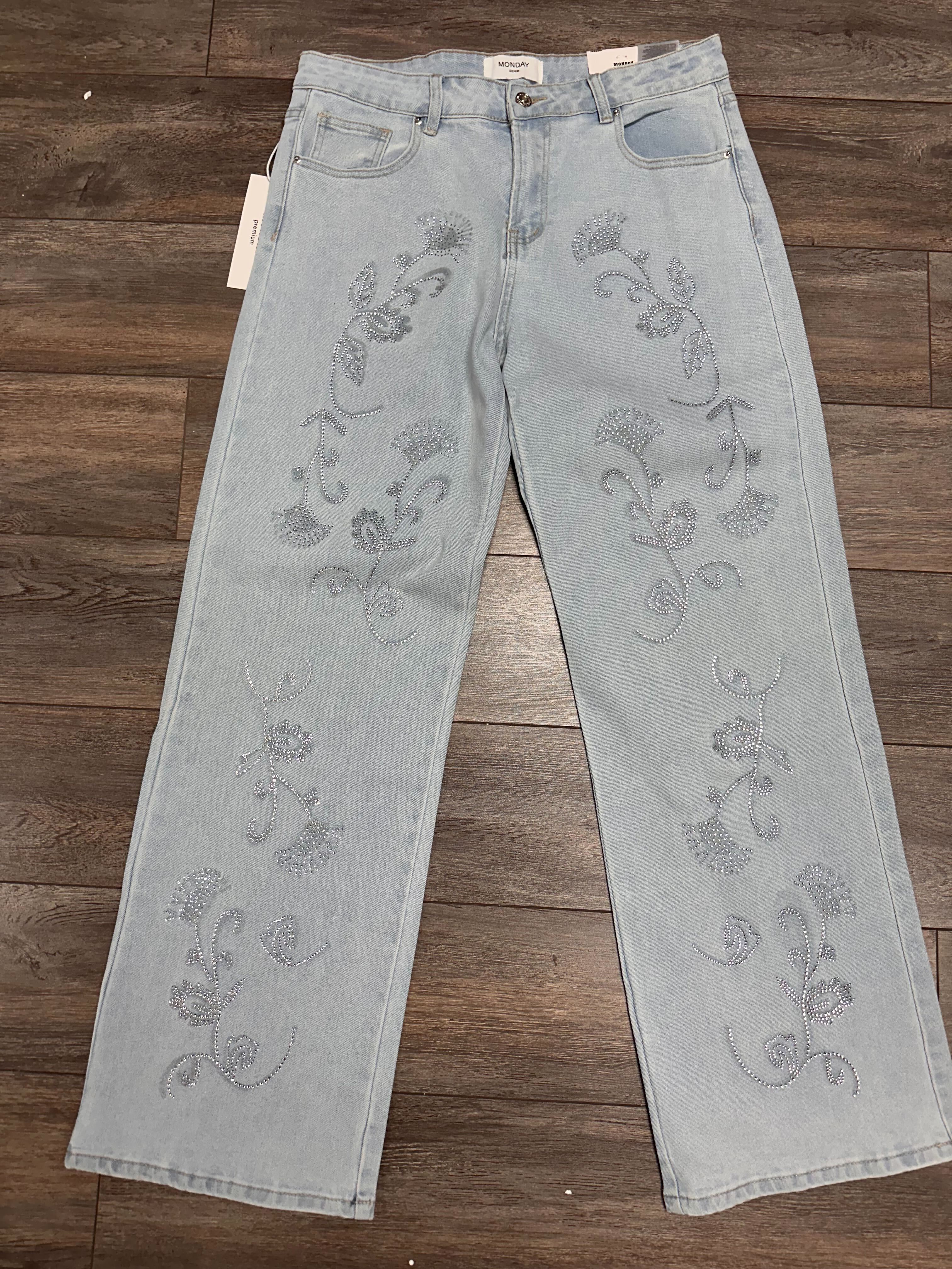 Jeans avec fleurs en brillants