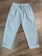 Pantalon magique avec boutons brillants