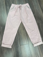 Pantalon magique avec boutons brillants