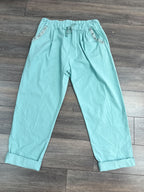 Pantalon magique avec boutons brillants