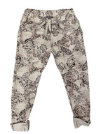 Pantalon à motif carreauté et fleurs