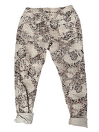 Pantalon à motif carreauté et fleurs