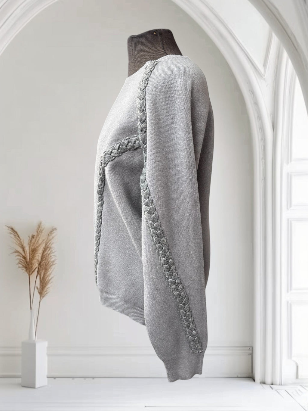 Chandail avec bandes tressées