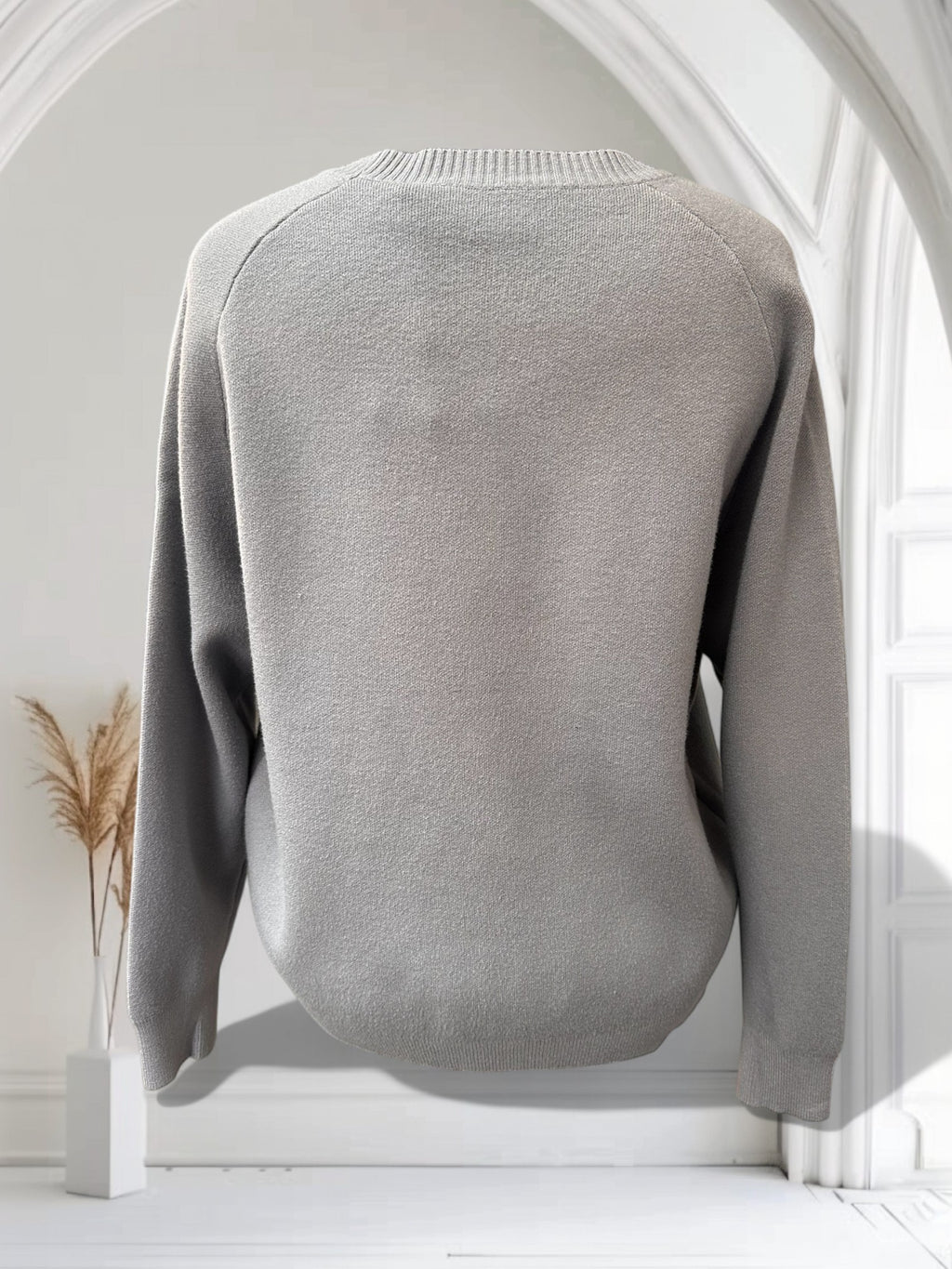 Chandail avec bandes tressées