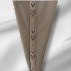 Pantalon avec cœur brillants sur les côtés