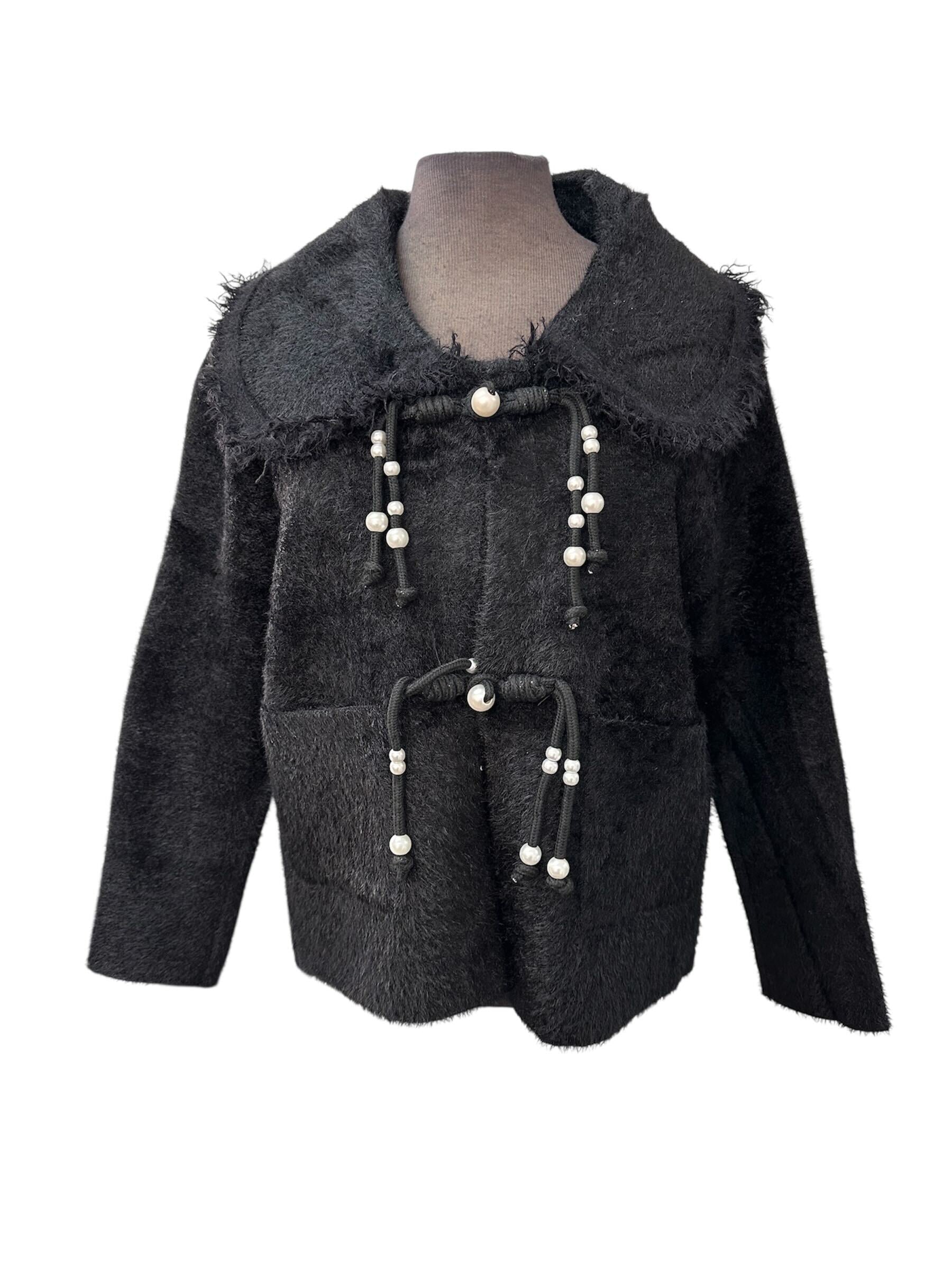 Veste avec attaches en perle