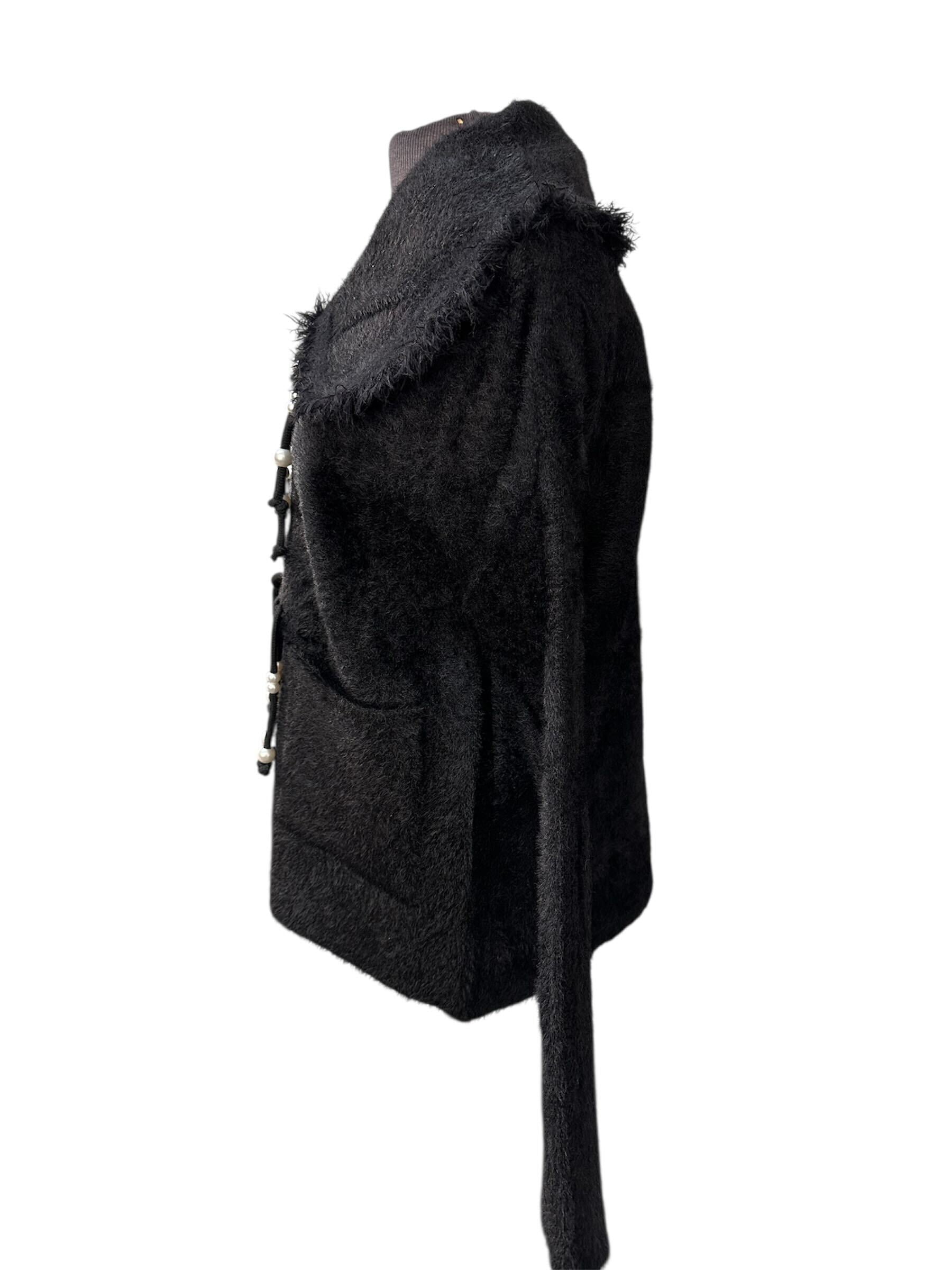 Veste avec attaches en perle