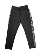 Pantalon avec ligne brillante léopard
