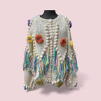 Cardigan/veste avec fleurs et franges