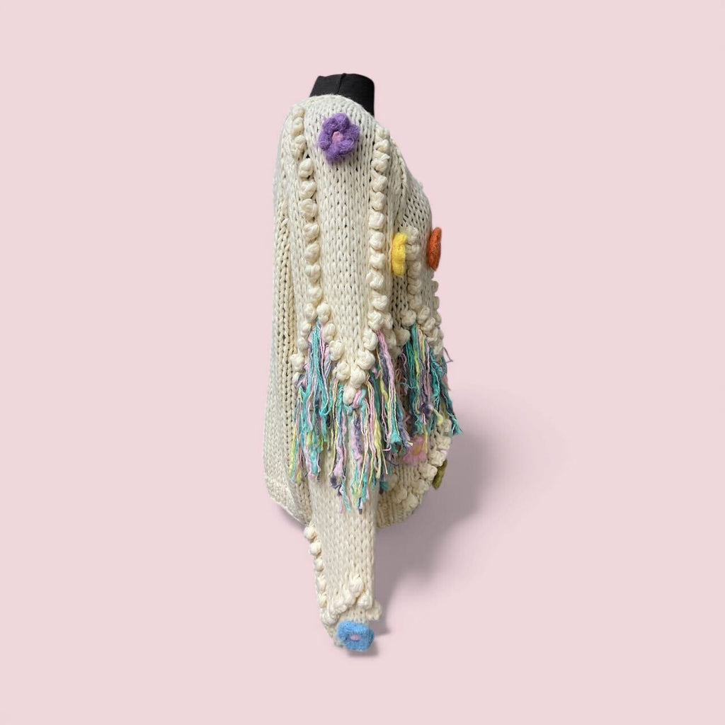 Cardigan/veste avec fleurs et franges