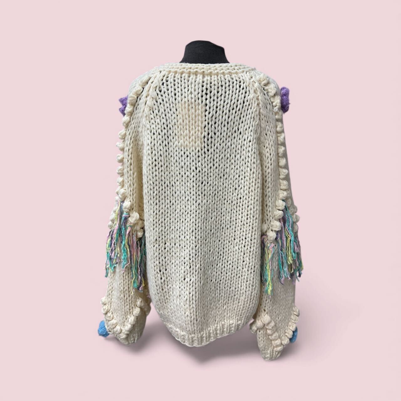 Cardigan/veste avec fleurs et franges