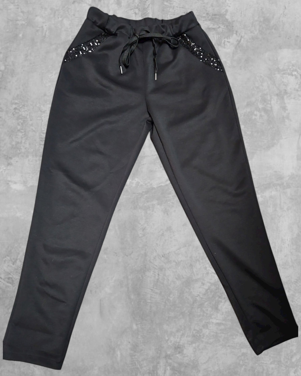 Pantalon avec bandes brillantes sur les poches