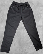Pantalon avec bandes brillantes sur les poches