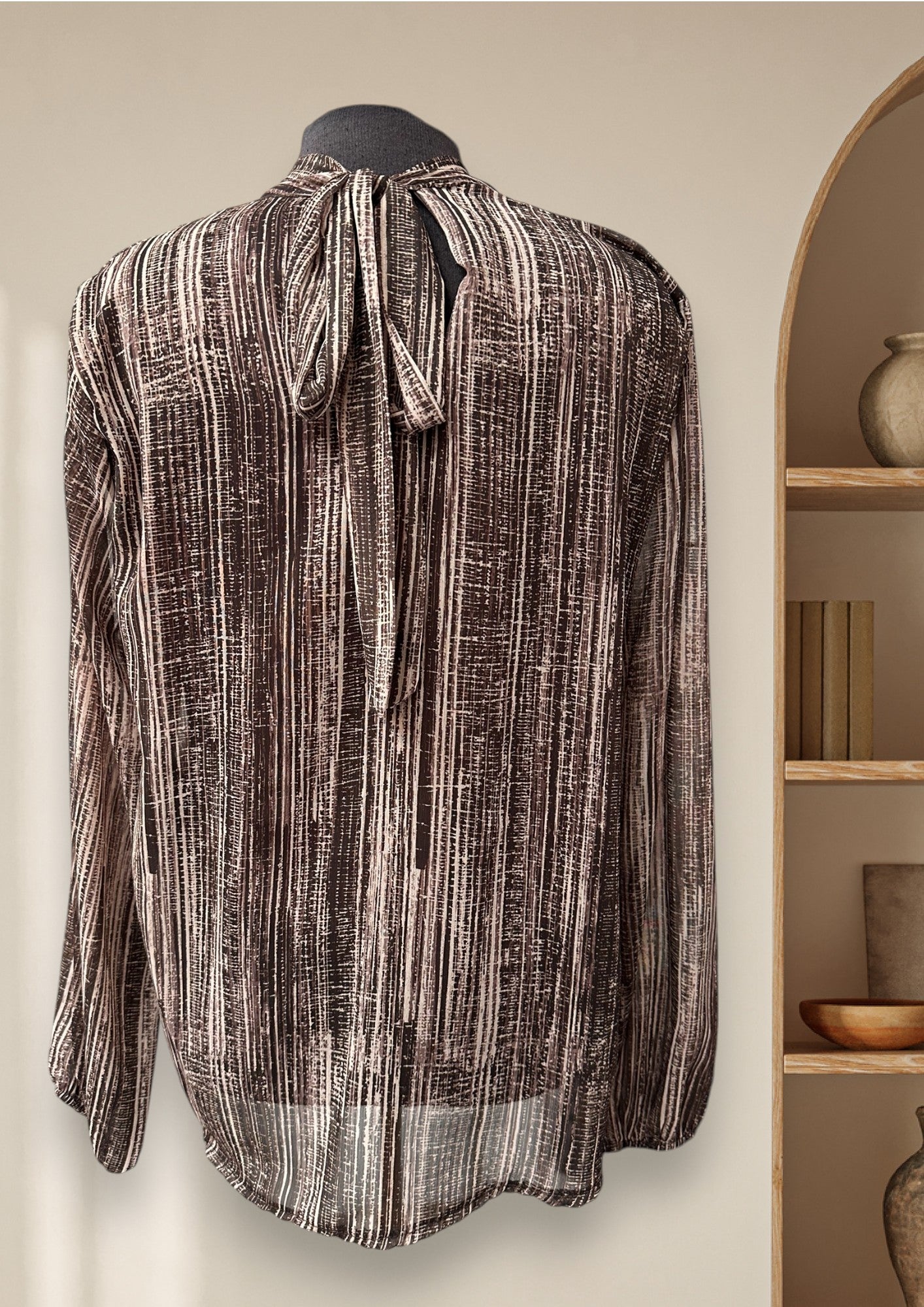 Blouse avec boucle à l'arrière du cou