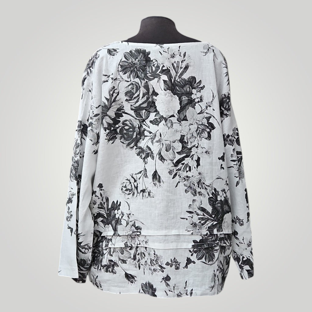 Blouse Boutique Sylbelle en lin et viscose à imprimé floral noir et blanc, manches longues, col bateau.