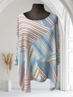 Blouse Boutique Sylbelle à rayures multicolores en polyester, coupe ample et confortable.