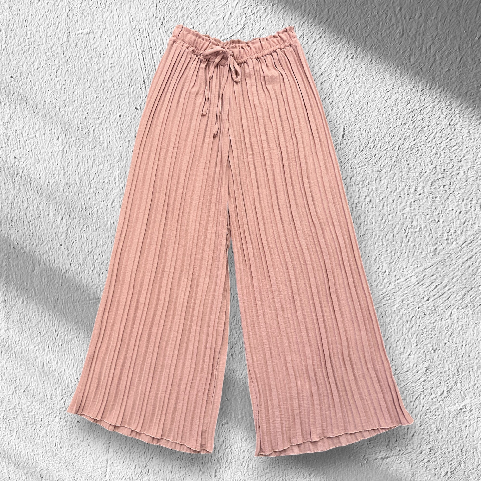 Pantalons à plis