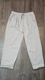 Pantalon magique avec boutons brillants