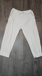 Pantalon magique avec boutons brillants