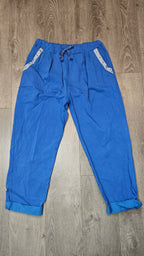 Pantalon magique avec boutons brillants